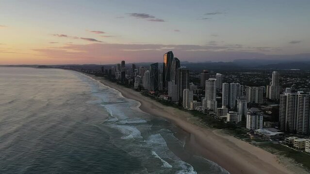 Aerial view over ocean past Broadbeach beach and surrounds at sunrise. Gold Coast, Australia.