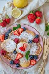 Close-up delicious pancakes, with fresh blueberries, raspberry 