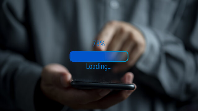 Hand holding mobile smartphone digital technology communication online loading data icon software system application virtual screen concept.