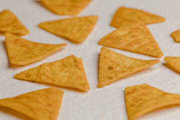 Mexican nachos chips, isolated on white background