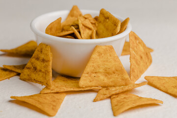 Mexican nachos chips, isolated on white background
