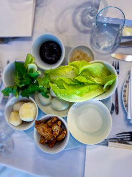 The main meal on Pesach is the Passover evening, or seder. the main dish is a plate for the seder. in Hebrew - keara. There are 6 products on it - an egg and a chicken wing, greens, water, etc.