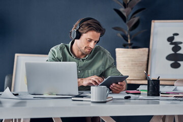 Music headphones, tablet and business man in office streaming radio podcast. Technology, professional and male person listening to audio, sound or song, online browsing or social media, email and app