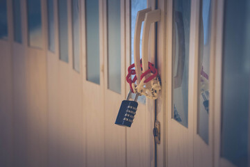 security locks,the key lock on wooden wall.