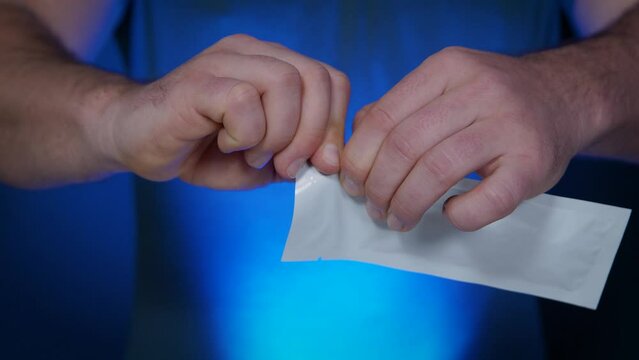 Open airtight and sterile white plastic package for home testing