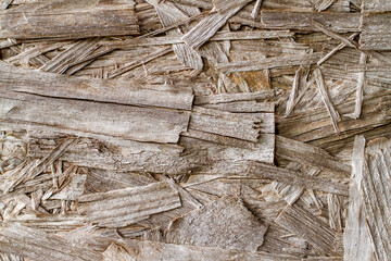 The texture of old particle board. The texture of old wood. Brown background texture.