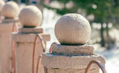 Stone balustrade in the city park. Selective focus