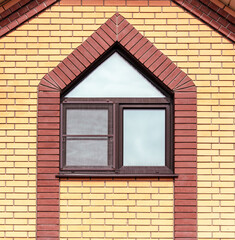 Window in a brick wall of a building