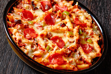 Pizza Casserole of pasta, beef, pepperoni, cheese