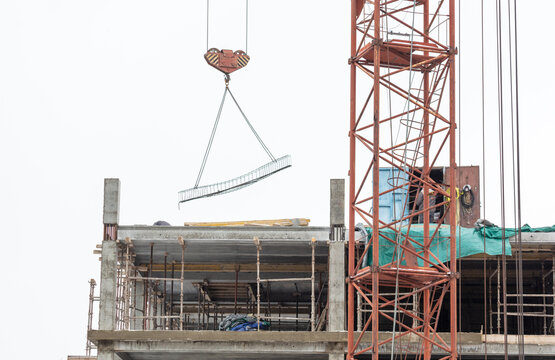 Construction of a multi-storey building with a tower crane