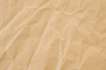Abstract brown crumpled creased recycle paper texture background