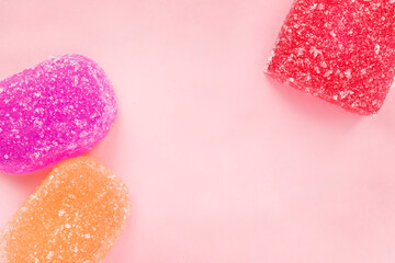 Jelly candies on pink background