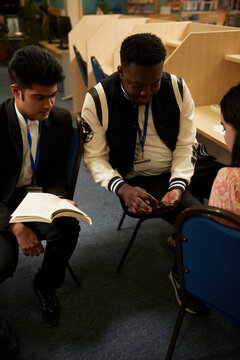 University students studying in library