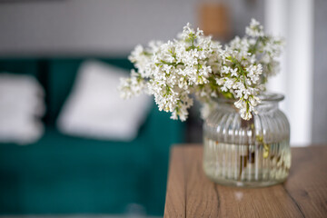 Fresh fragrant lilac flowers in the home interior