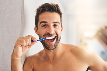 Portrait, toothbrush and happy man brushing teeth in morning for dental wellness, healthy habit and...