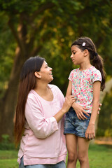Naklejka premium Happy Mother and daughter in the park