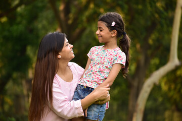 Happy Mother and daughter in the park