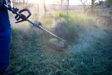 mowing a lawn with lawn mower
