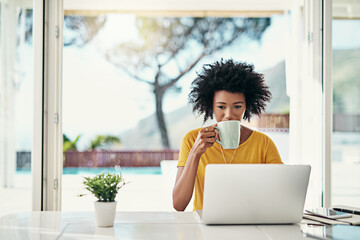 Laptop, coffee and relax with black woman at home for planning, website and remote worker. Blog, networking and social media with female freelancer reading for email, technology and internet