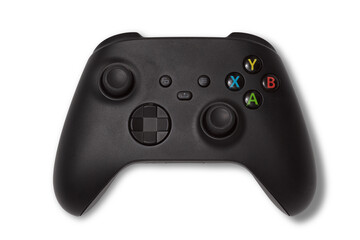 photo of used black gamepad console controller isolated over a transparent background, gaming...