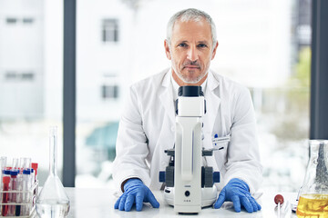 Man, microscope and portrait of scientist in science research, breakthrough or discovery at the...