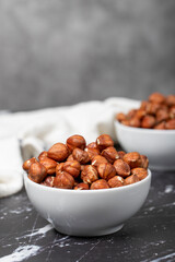 Hazelnut. Peeled hazelnuts in ceramic bowl. Superfood. Vegetarian Food concept. Healthy snacks. Close up