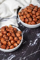 Hazelnut. Peeled hazelnuts in ceramic bowl. Superfood. Vegetarian Food concept. Healthy snacks