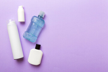 Composition with bath cosmetics on table. razor, toothpaste, soap, gel, toothbrush, mouthwash and other various accessories. Cosmetics for skin health. Bath Mockup for your logo