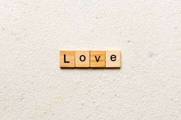 love word written on wood block. love text on table, concept