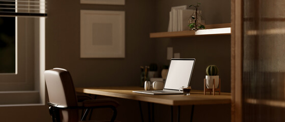 Side view of a modern contemporary workspace with laptop mockup on a table