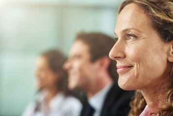 Woman, face and audience at a seminar to listen to growth about achievement a conference to learn. Team, together and listening to training at the office for planning a startup with the manager.