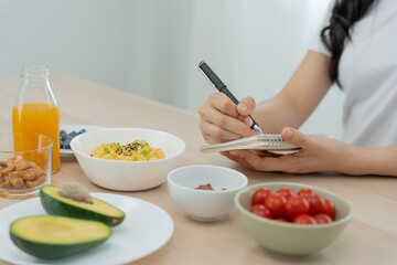 Diet, Dieting. Beautiful woman eat clean food for weight loss, slim, good health. Female enjoy with nutrition, low calorie, organic vegetable. Nutritionist healthy food. keto, vegetarian, low fat