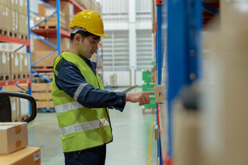 Warehouse worker pick box goods in inventory and check stock product. Transport logistic business ship delivery to customer. stock card, bill of material, inspection, storehouse, storage, factory