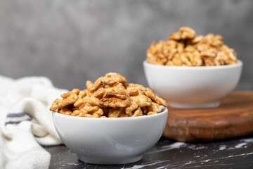 Walnut. Fresh walnuts in a ceramic bowl. superfood. Vegetarian food concept. healthy snacks. Close up