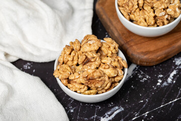 Walnut. Fresh walnuts in a ceramic bowl. superfood. Vegetarian food concept. healthy snacks