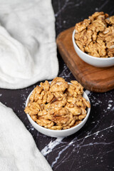 Walnut. Fresh walnuts in a ceramic bowl. superfood. Vegetarian food concept. healthy snacks