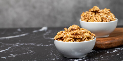 Walnut. Fresh walnuts in a ceramic bowl. superfood. Vegetarian food concept. healthy snacks. Copy space. Empty space for text