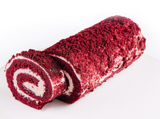 Sponge Swiss roll on white plate