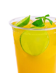 Alcohol cocktails with orange juice and lime slices