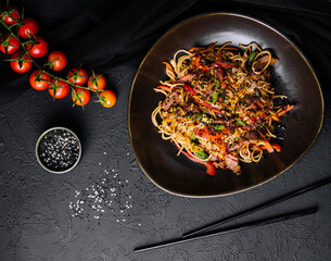 Japanese udon, soba with beef on black bowl