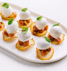 Italian style appetizer on white plate