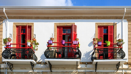 Retro style balconies on old house