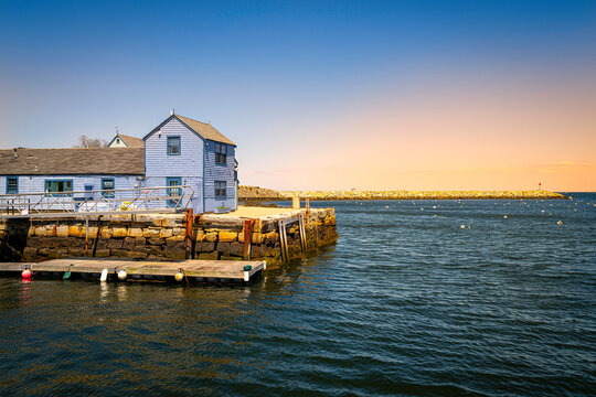 Blue houses of the old fishing village in Rockport, Cape Anne, Massachusetts at sunrise