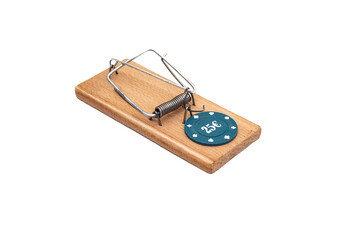 Isolated Mousetrap with a Poker Chip as Bait. Gambling Addiction Concept.