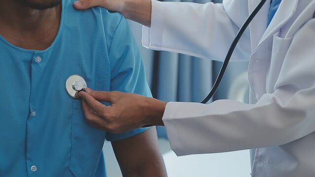 Men's health exam with doctor or psychiatrist working with patient having consultation on diagnostic examination on male disease or mental illness in medical clinic or hospital mental health service