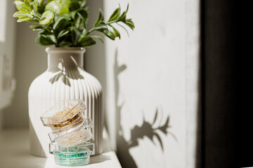 Gypsum vase, handmade by the window with flowers. Glitter for face, eye, body color gel for store content. Mini vase for dried flowers and natural flowers.