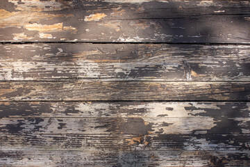 Old faded boards, texture background. Old boards, wooden shabby background, close-up.