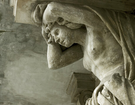 Titan and Atlantean holds the world on his back. Greek mythology. (statue of the end of the eighteenth century)	