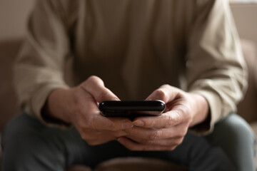 Social media and digital online concept, man using smart phone. The concept of living on vacation and playing social media. Social Distancing ,Working From Home
