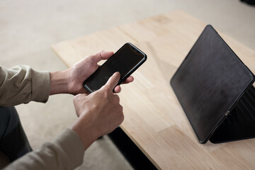 Social media and digital online concept, man using smart phone. The concept of living on vacation and playing social media. Social Distancing ,Working From Home